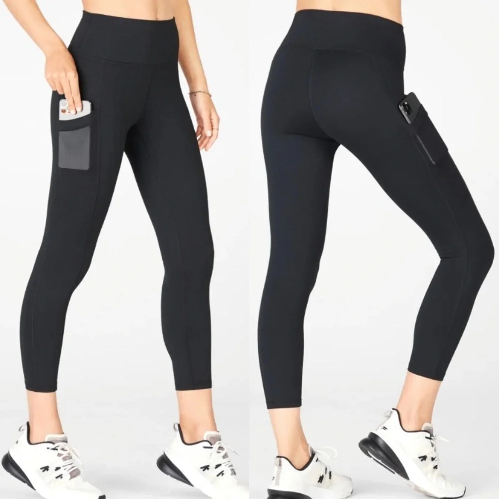 Fabletics black mesh side and mesh pocket legging high rise size medium